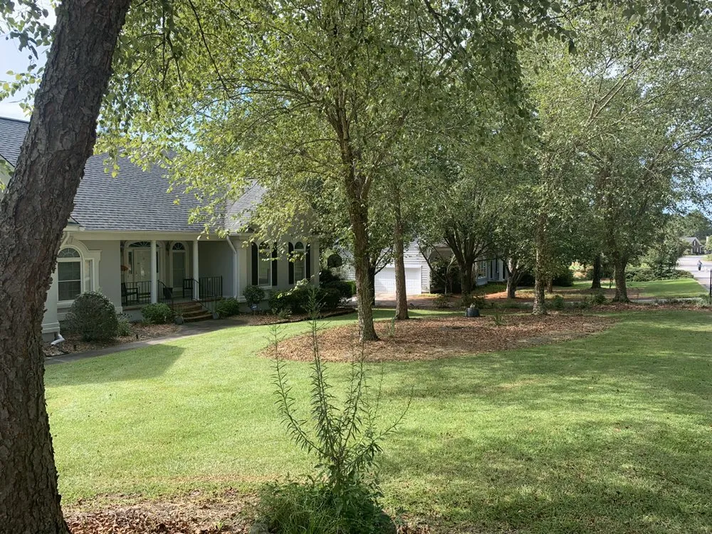 Custom landscape installation with custom design in Winnsboro, SC by Rays lawn care and pressure washing
