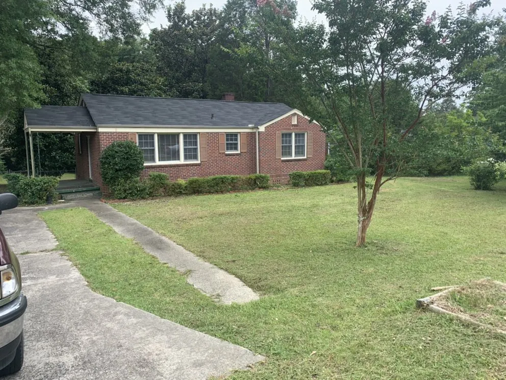 Local yard cleanup service with custom design in Winnsboro, SC by Rays lawn care and pressure washing