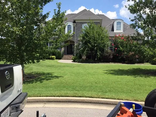 Ray's Reliable Lawn Services Logo