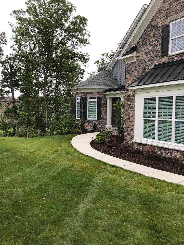 Custom landscape design for outdoor upgrades in Fort Mill, SC by R&B Lawn Care