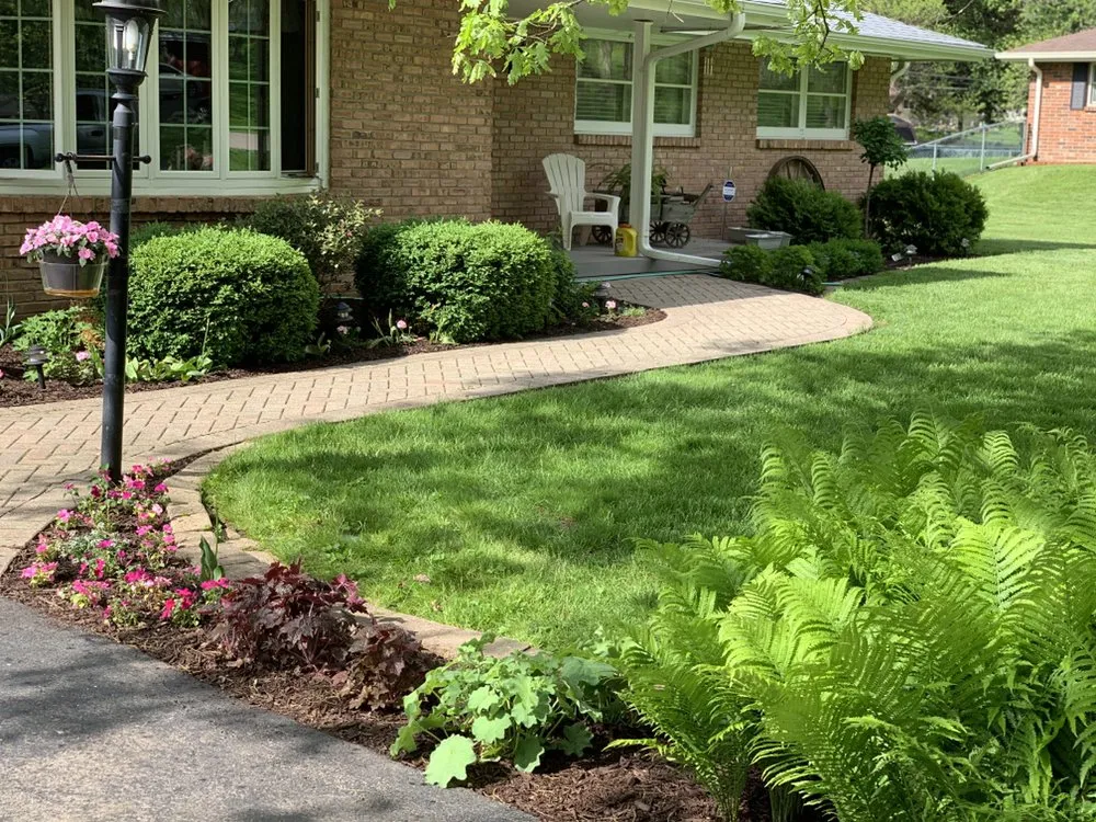 Affordable lawn mowing service with custom design across Loves Park, IL - R&B Yard Care and Maintenance