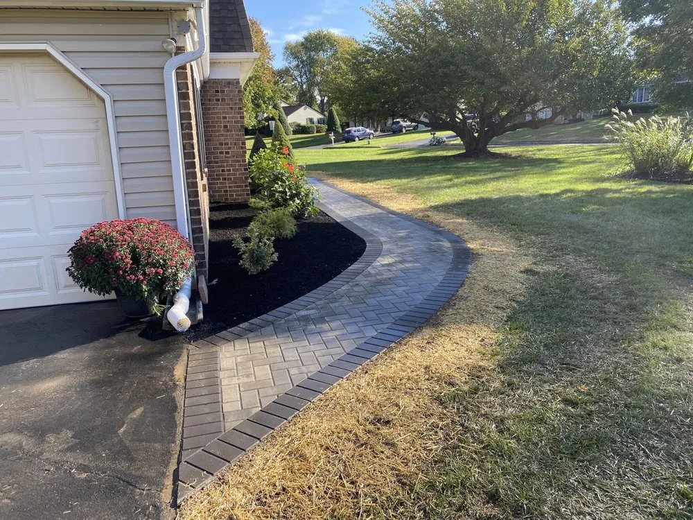 Professional yard cleanup service for year-round maintenance in Warrington, PA by Rc Hardscaping