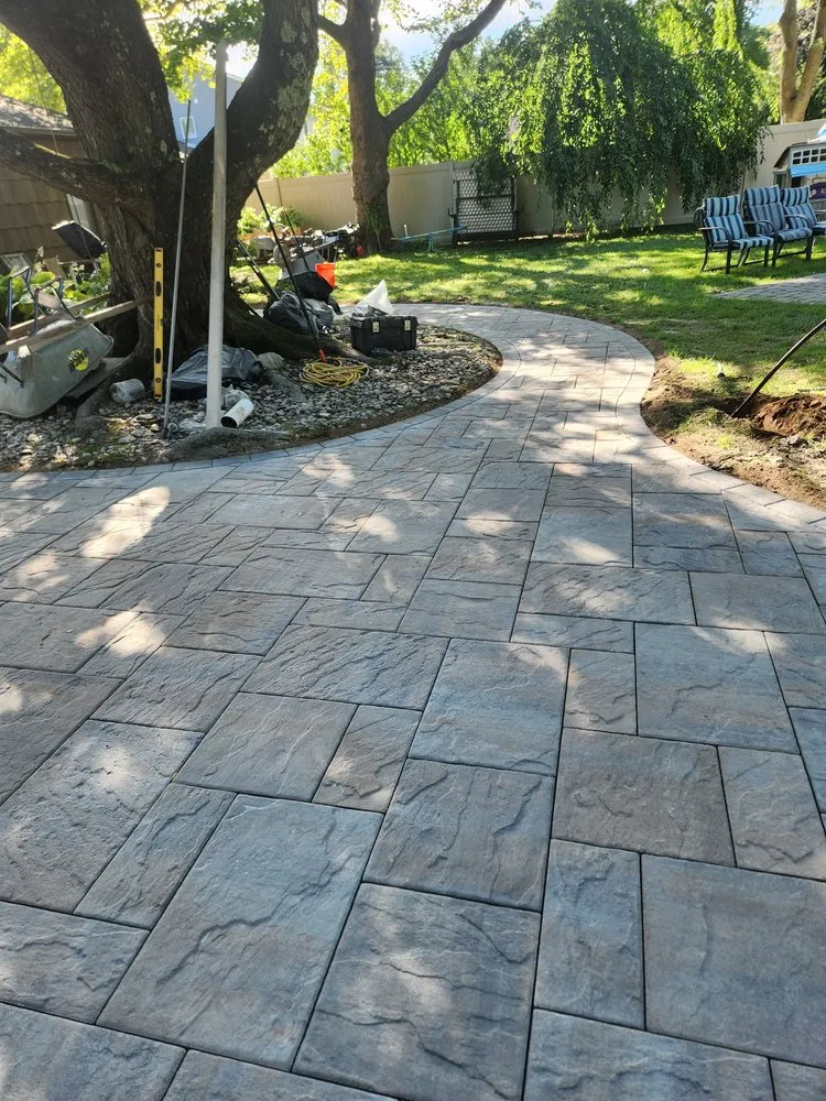 Affordable landscape installation for beautiful yards in Deer Park, NY by RC Landscaping & Masonry
