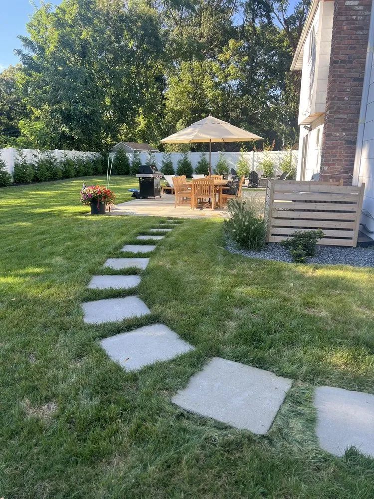 Reliable lawn mowing service with custom design across Deer Park, NY - RC Landscaping & Masonry