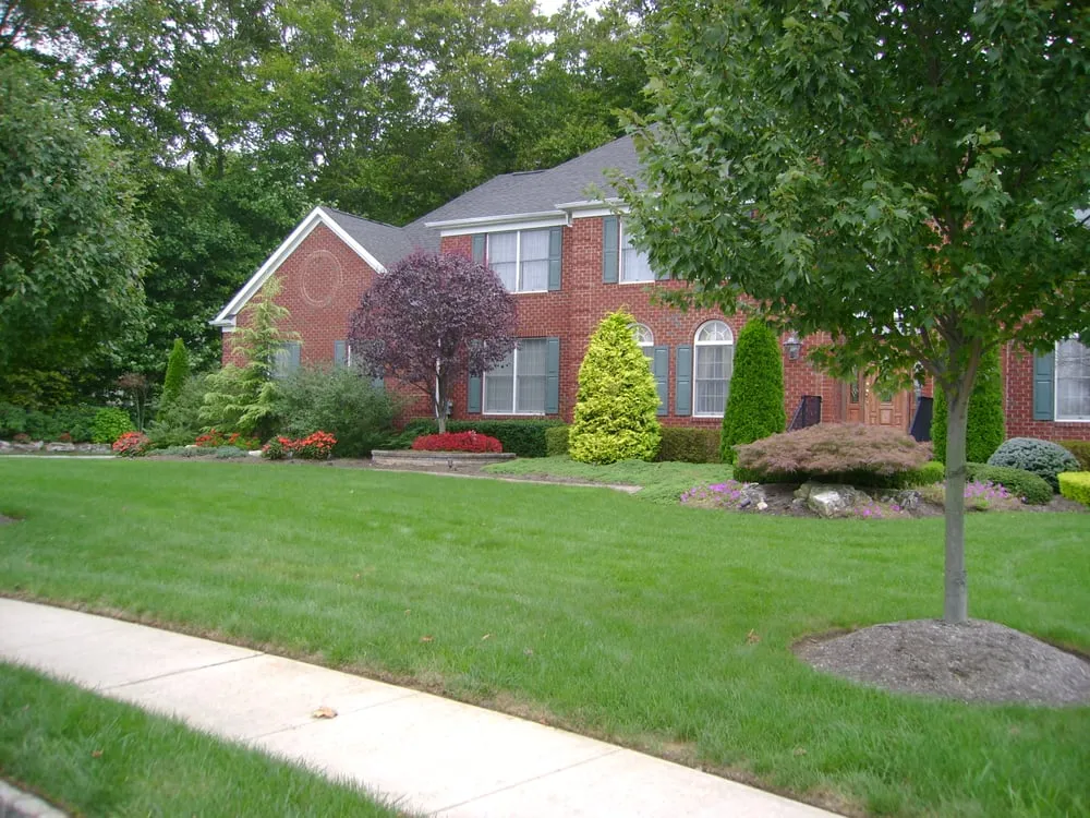 Trusted lawn mowing service with custom design in Lincroft, NJ by RC Landscaping