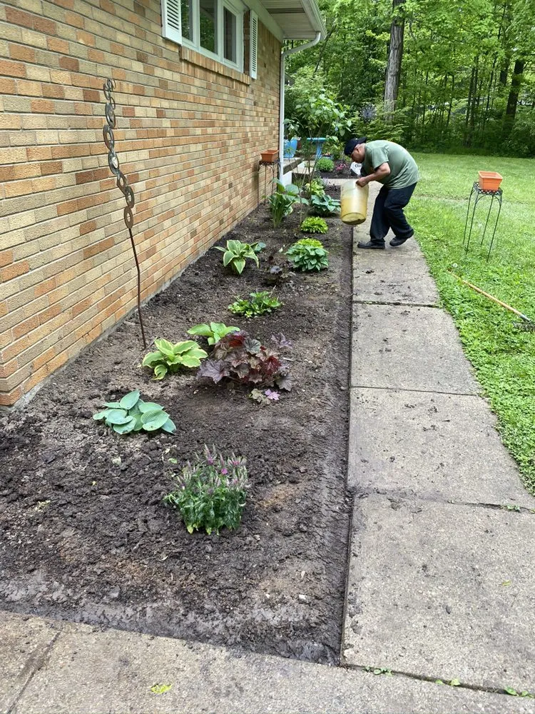 Professional lawn care service with custom design across Lawrence, IN - R&C Tree And Landscaping services