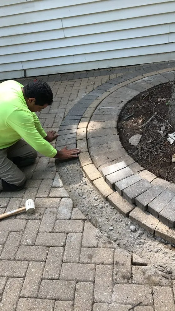 Custom landscape design for homes in Elgin, IL by RC Tree Service & More