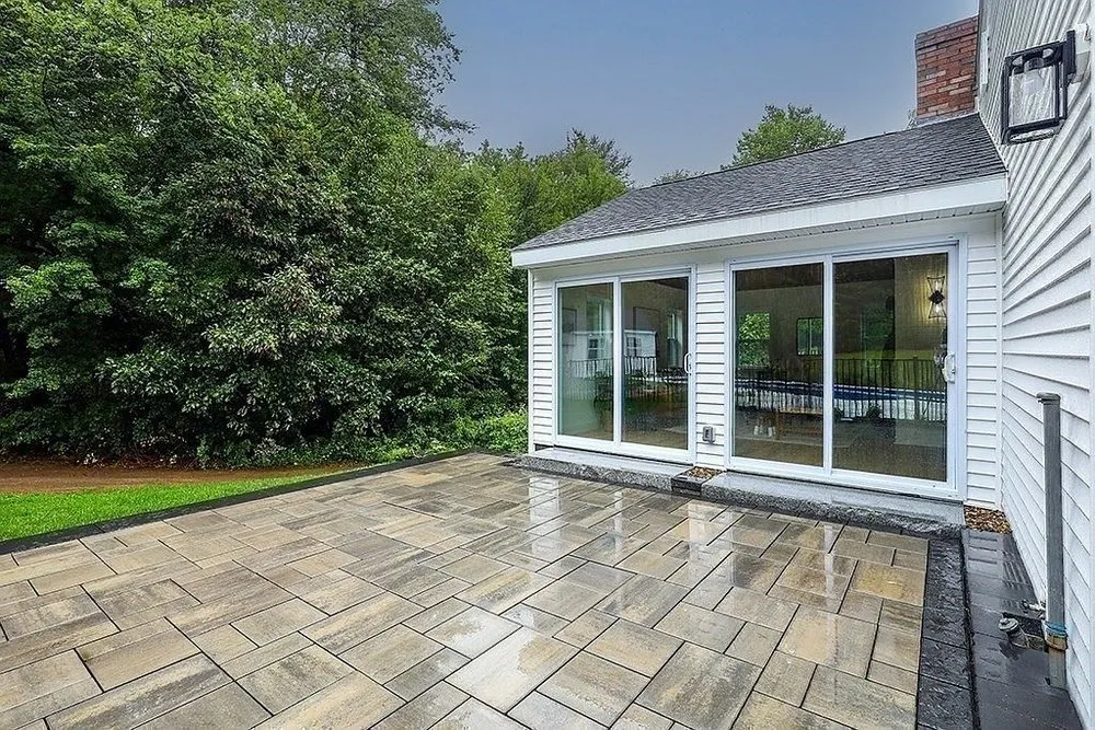 Expert lawn mowing service for year-round maintenance in Acton, MA by RD Landscape & Design