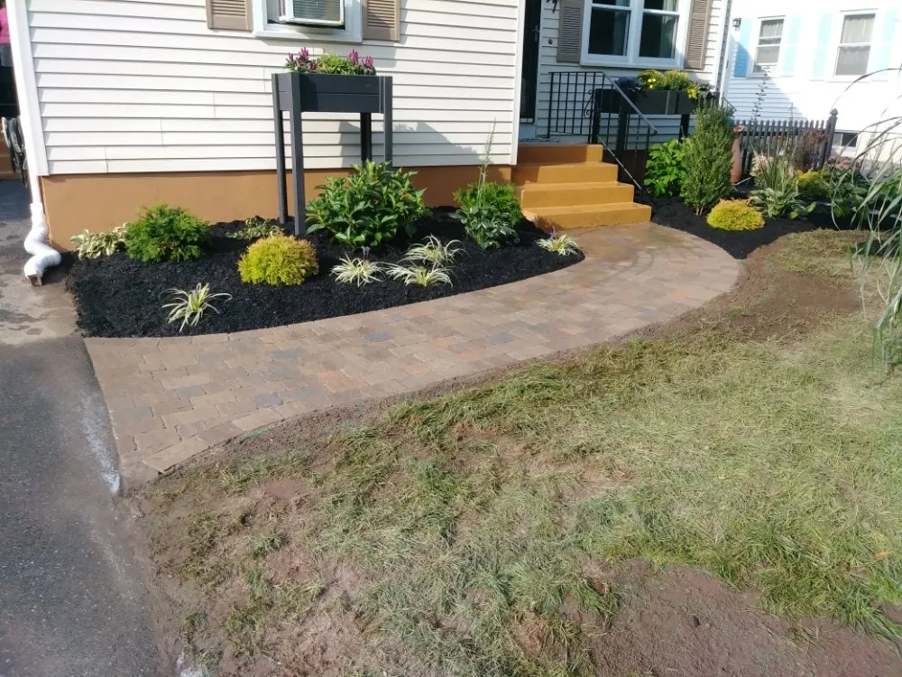 Affordable landscape installation in Essex, MA by R&D landscapes