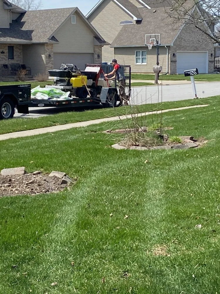 Custom lawn care service for homes across Grant Park, IL - Re-Green Fertilizing & Weed Control