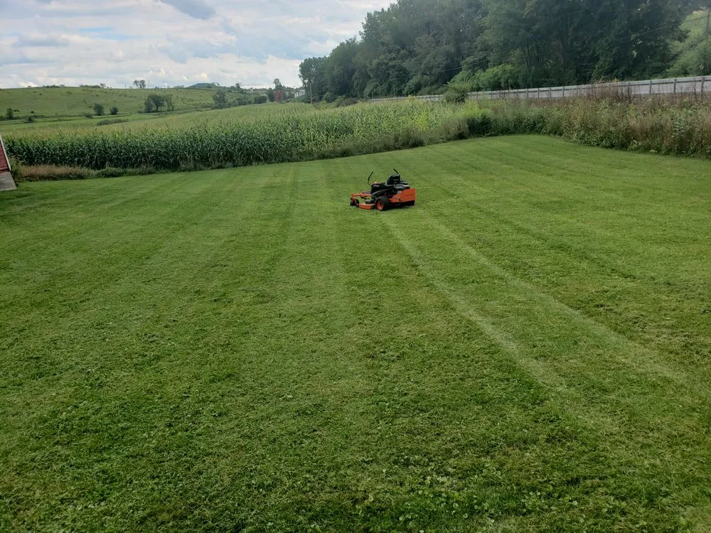Professional garden landscaping with custom design in Granville, NY by Rebel engine's and lawnworks