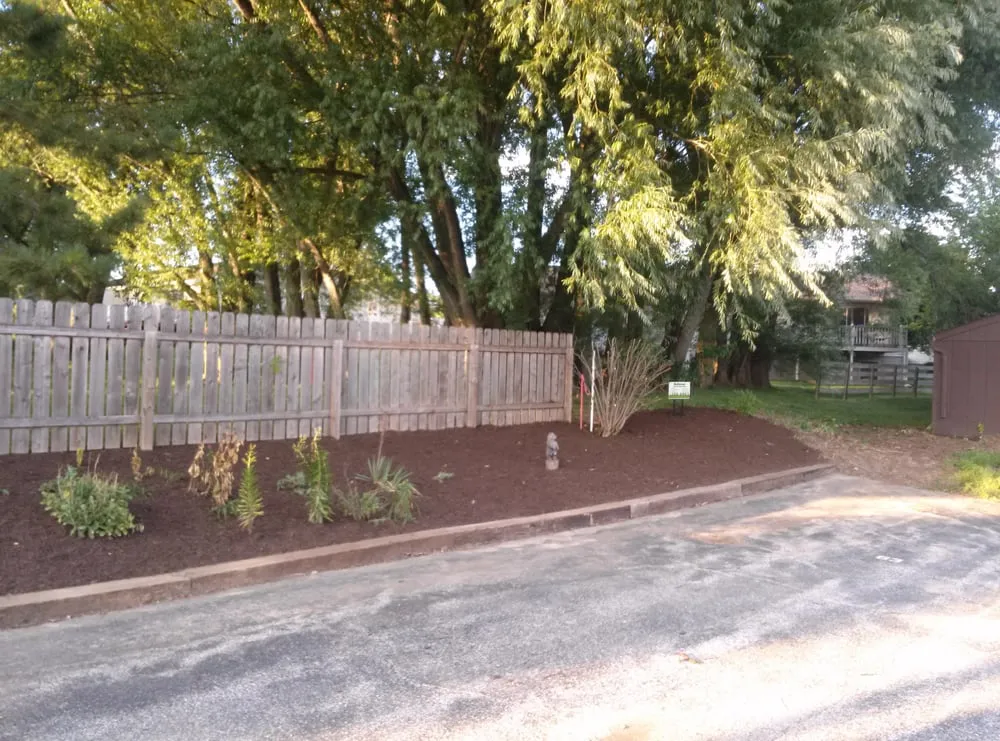 Professional landscape design for year-round maintenance in East Moline, IL by Rebenar Services