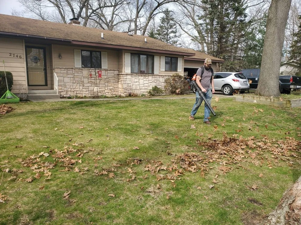 Professional lawn mowing service in Muskegon, MI by Red Barn Group