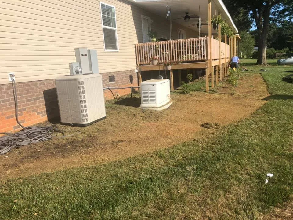 Affordable lawn care service in Sophia, NC by Red Clay Landscapers