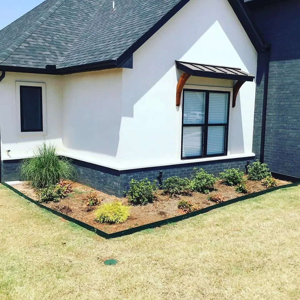 Custom landscape installation in Shawnee, OK by Red Dirt Land Management