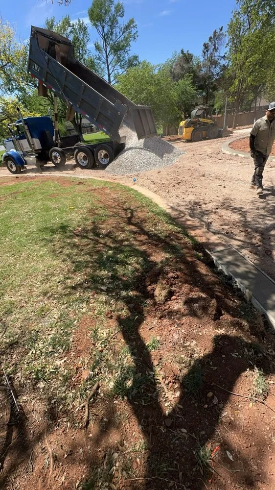 Custom landscape installation for beautiful yards in Edmond, OK by Red Dirt Lawn & Landscape