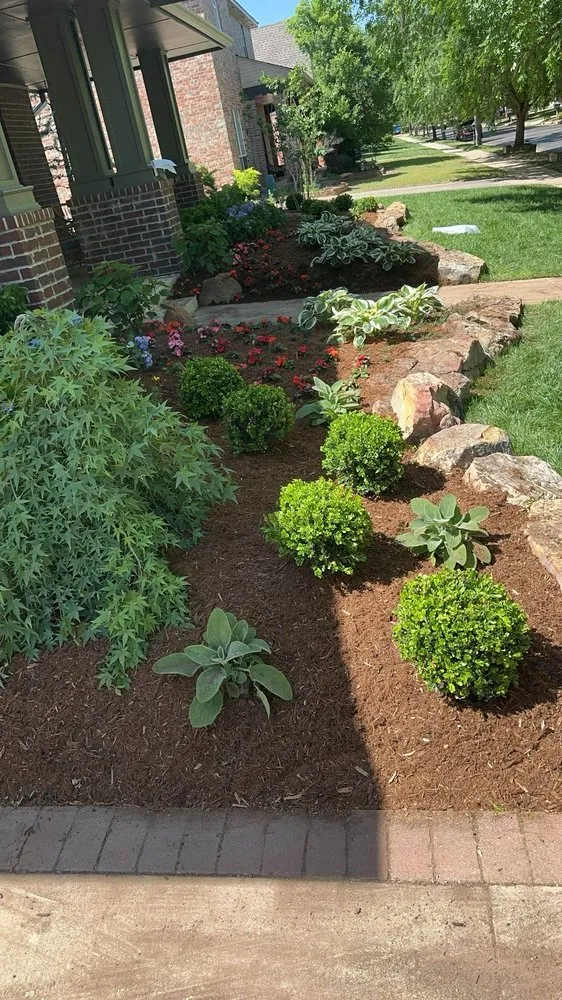 Custom landscape installation in Edmond, OK by Red Dirt Lawn & Landscape