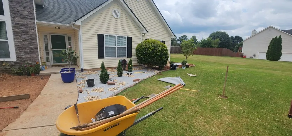 Custom landscape installation with custom design in Flowery Branch, GA by Red Fox Landscaping