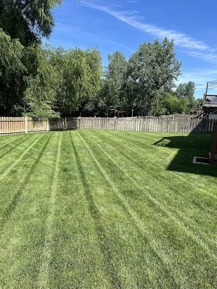 Affordable landscape design in Liberty, MO by Red Horse Lawncare & Firewood