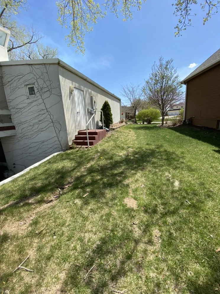 Affordable lawn mowing service for year-round maintenance across Omaha, NE - RED Lawn Service