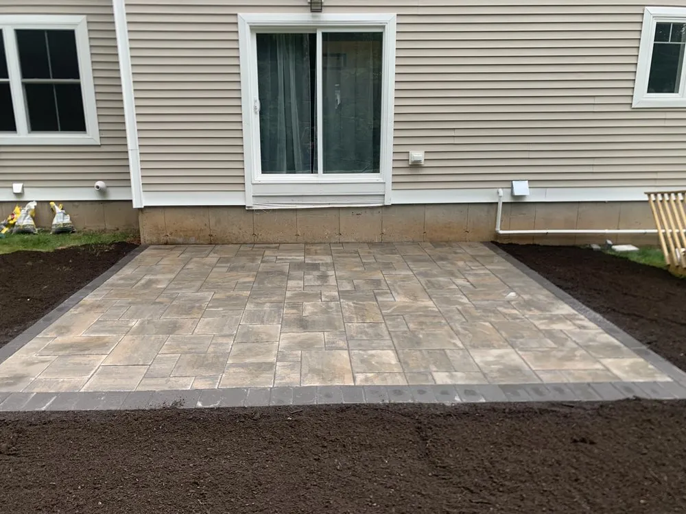 Custom yard maintenance for outdoor upgrades in Moodus, CT by Red Line Landscapes