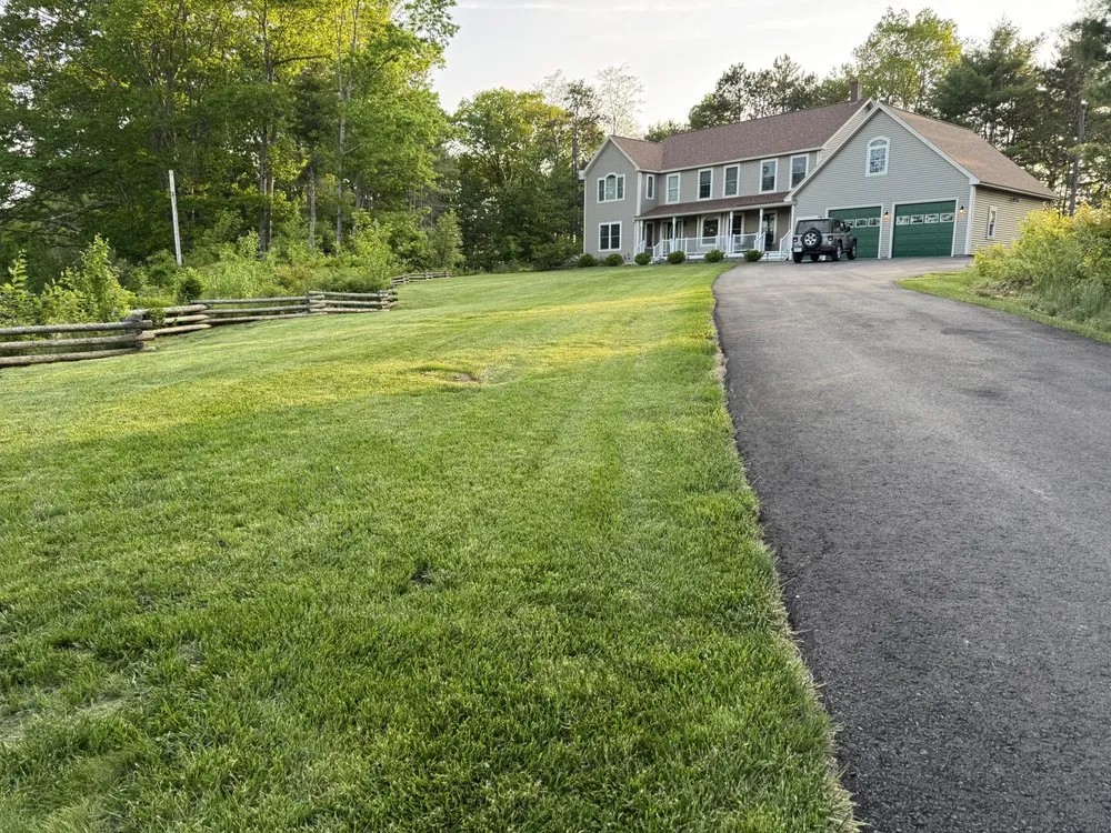 Professional landscape installation in Hermon, ME by Red Line Lawn Care
