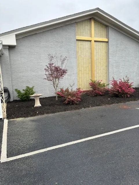 Professional outdoor landscaping with custom design in Kinston, NC by Red Line Lawn Care