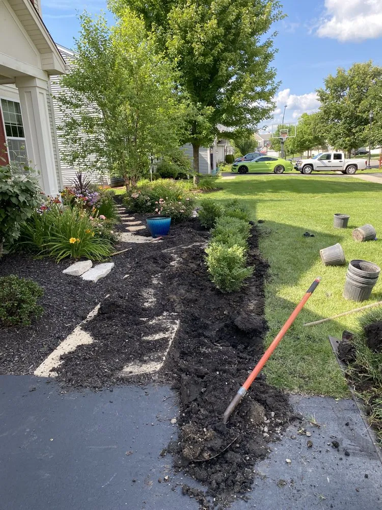 Trusted lawn care service with custom design in Harvard, IL by Red Maple Landscaping & Tree Services