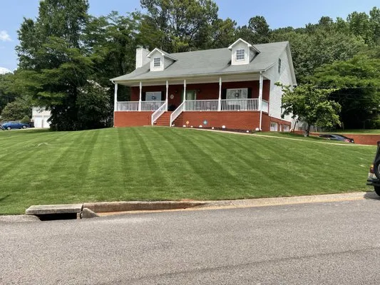 Red Mountain Lawn Care Logo