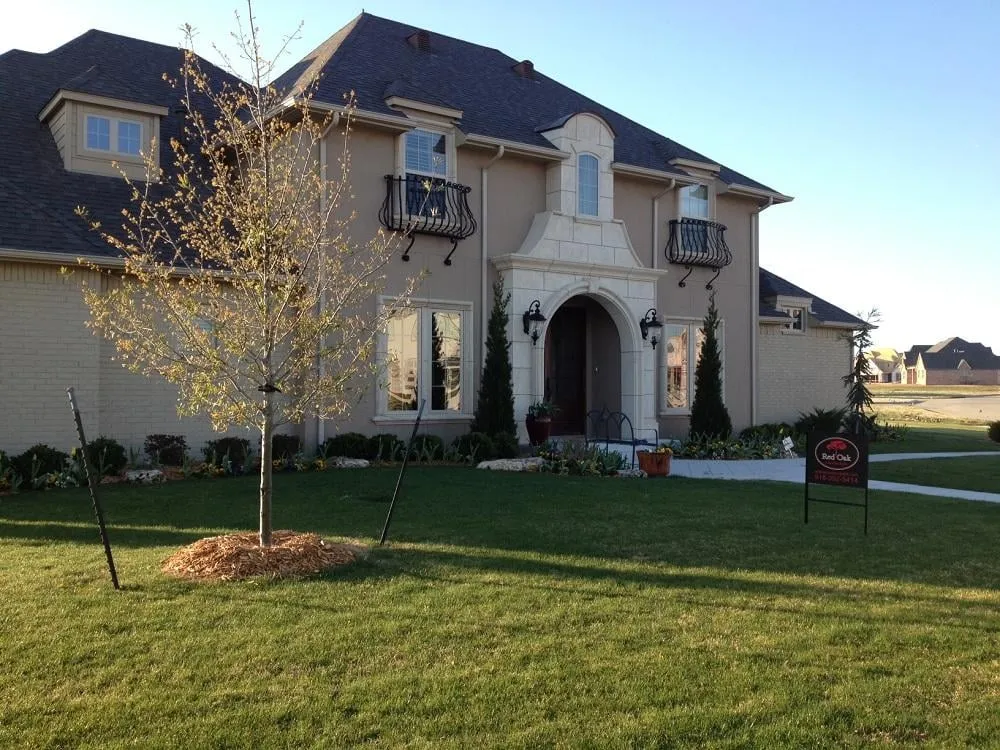 Reliable lawn mowing service in Jenks, OK by Red Oak Landscape