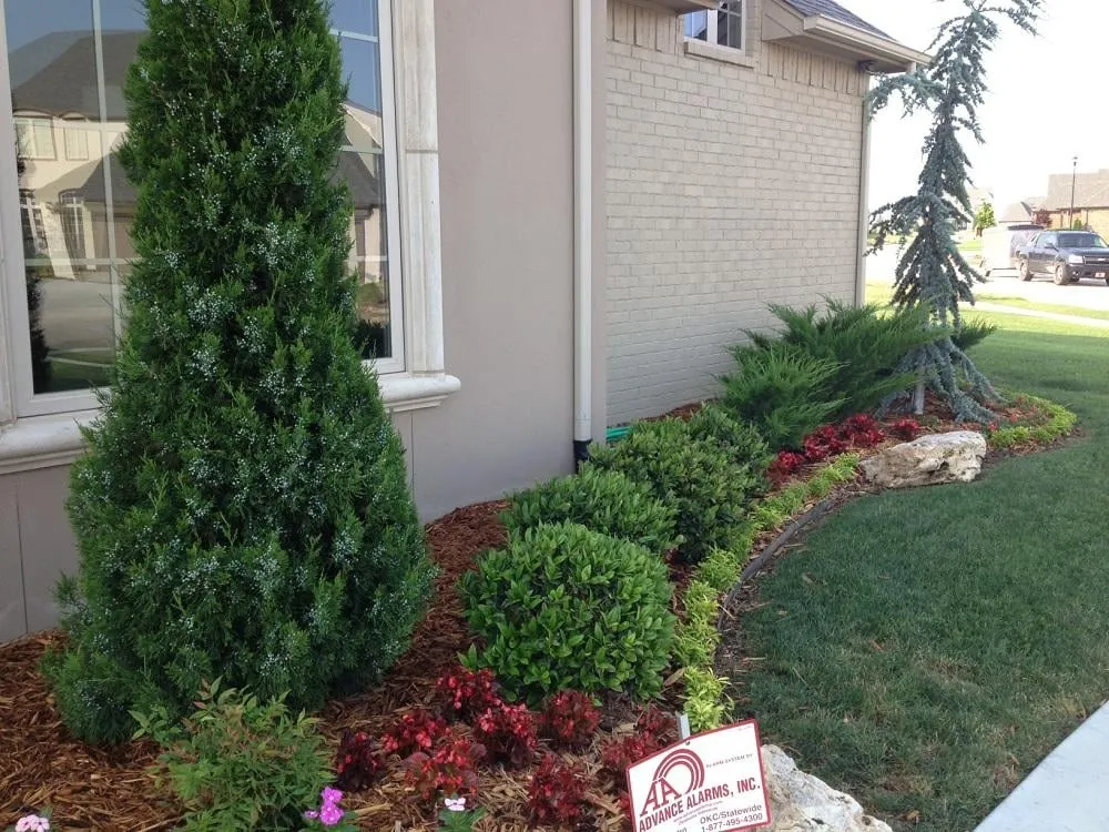 Affordable residential landscaping for year-round maintenance in Jenks, OK by Red Oak Landscape