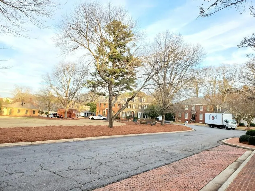 Expert lawn mowing service with custom design in Marietta, GA by Red Pinestraw