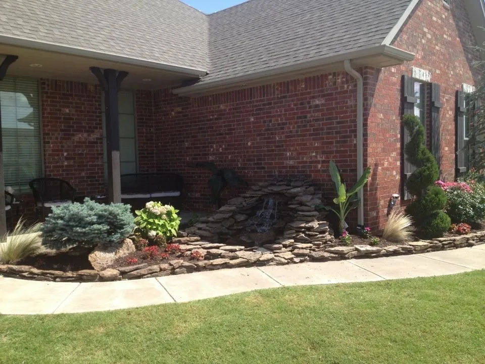Local yard maintenance for homes in Oklahoma City, OK by Red River Landscaping and construction