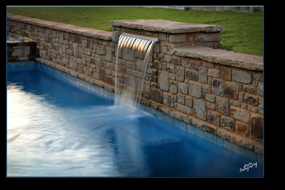 Custom lawn care service for outdoor upgrades in Edmond, OK by Red Rock Landscape & Design