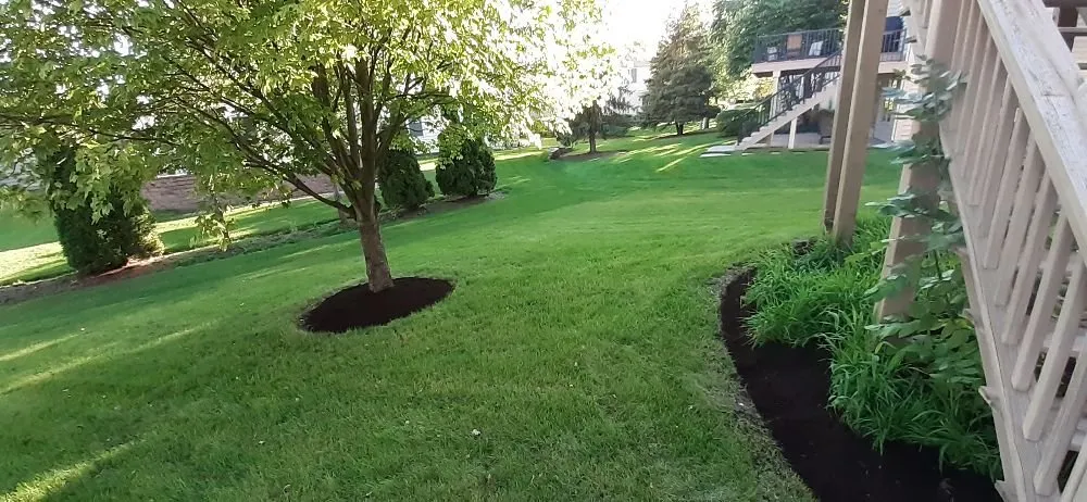 Custom garden landscaping in Carpentersville, IL by Red Rock Landscaping