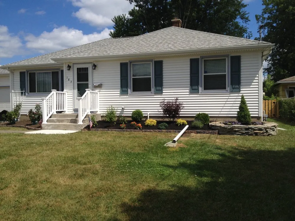 Expert lawn care service with custom design across Tonawanda, NY - Red Rose Landscaping