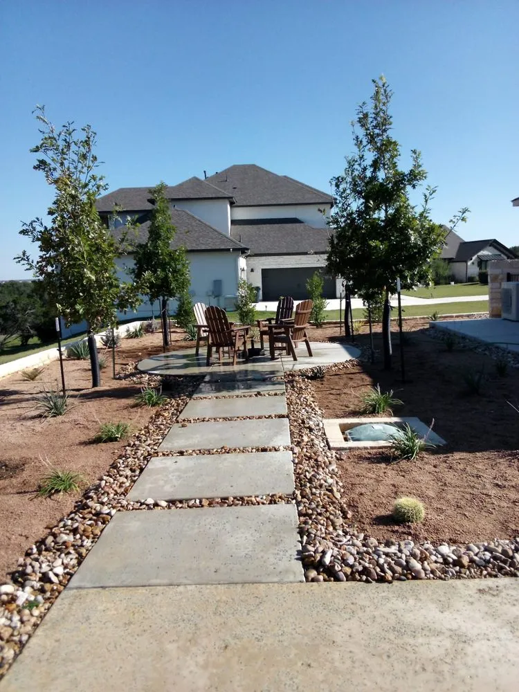 Professional outdoor landscaping for year-round maintenance across Jarrell, TX - Red Tip Landscaping