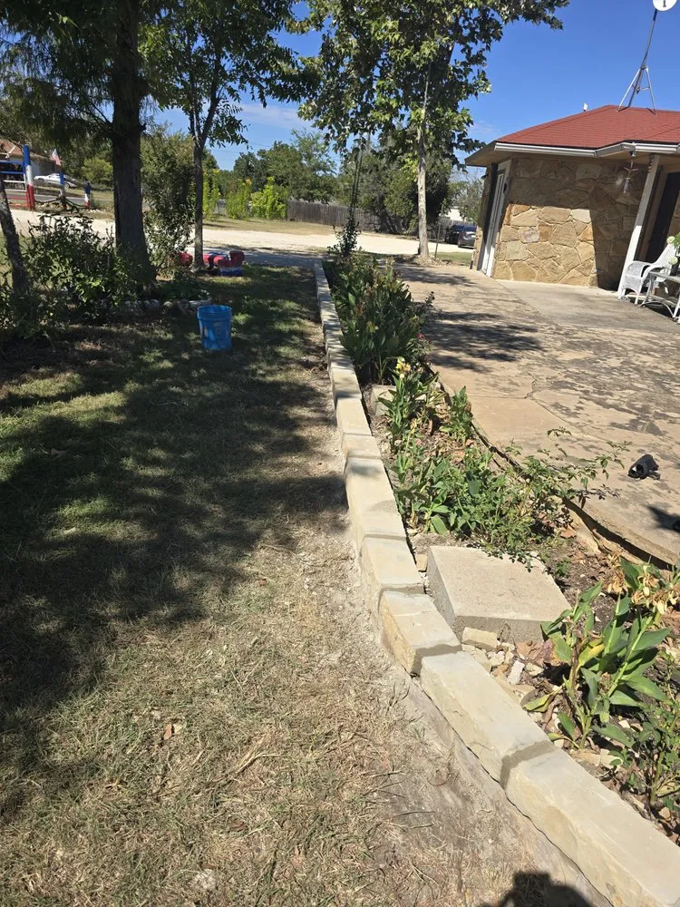 Professional lawn mowing service in Jarrell, TX by Red Tip Landscaping