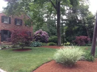 Local residential landscaping with custom design in Chelmsford, MA by Red Wagon Landscaping