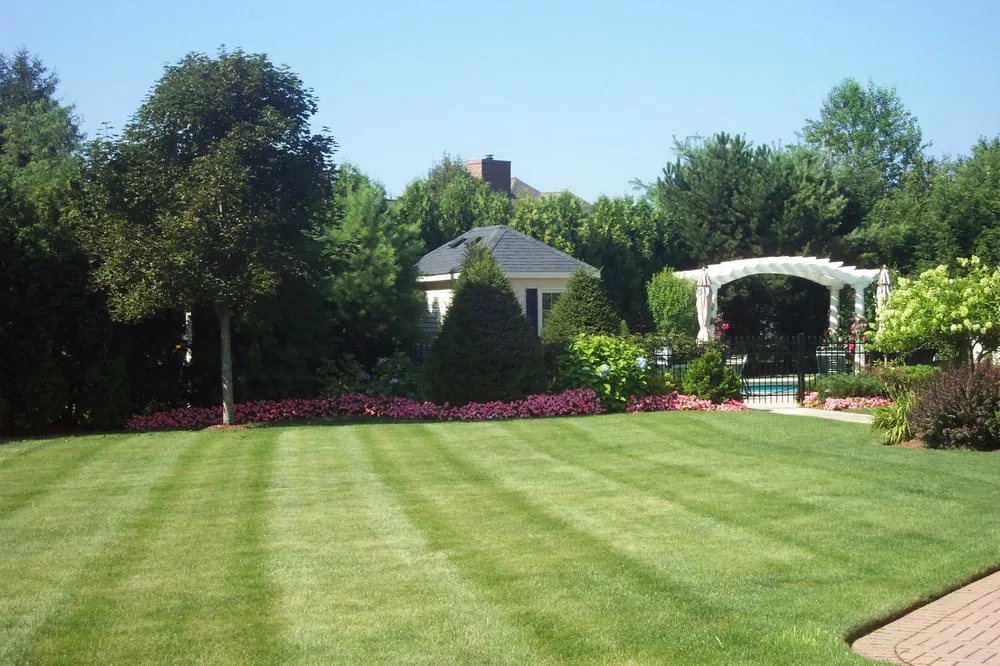Expert lawn mowing service in Chelmsford, MA by Red Wagon Landscaping
