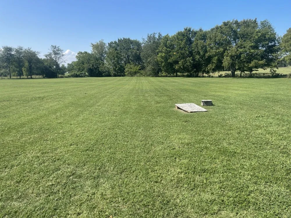 Professional yard cleanup service in Tahlequah, OK by RedBird Mowning Service's