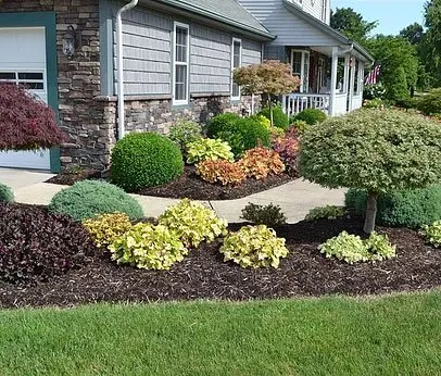 Custom landscape installation for residential properties across Claremore, OK - Redbud Property Maintenance