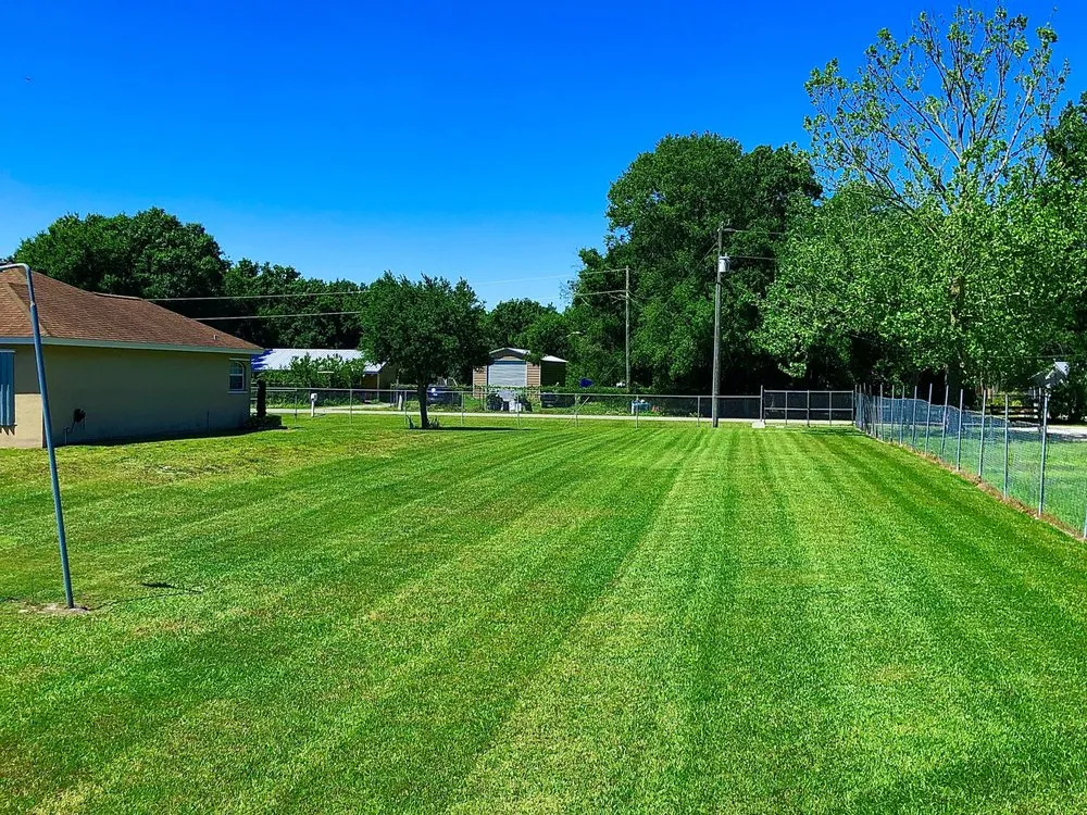 Affordable lawn mowing service in Okeechobee, FL by Redemption Lawn Care