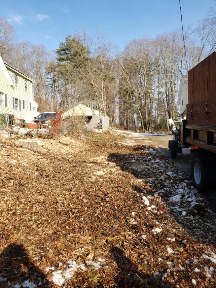 Custom outdoor landscaping in Oakham, MA by Redemption Tree & Landscape