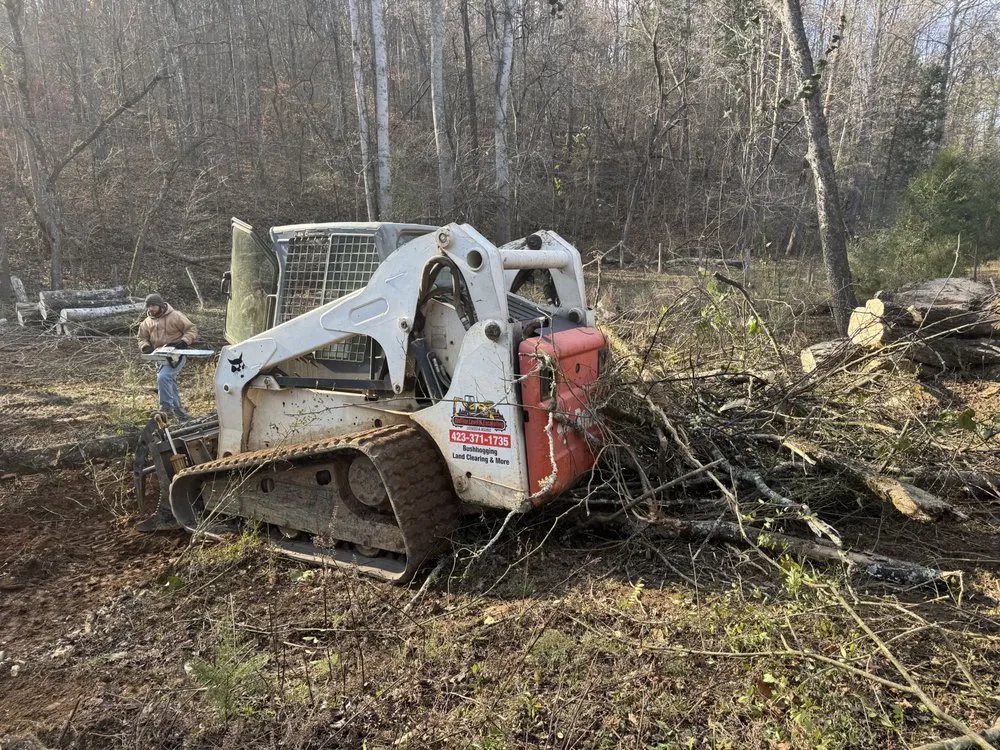 Custom lawn mowing service with custom design in Tellico Plains, TN by Redline Lawn & Excavating