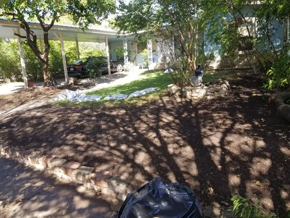 Professional garden landscaping for year-round maintenance in San Antonio, TX by Reds Lawn Care Service
