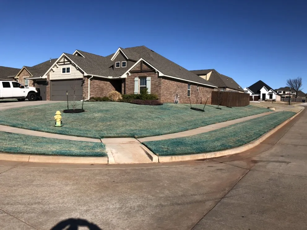 Custom landscape design for residential properties in Mustang, OK by Reed Lawncare