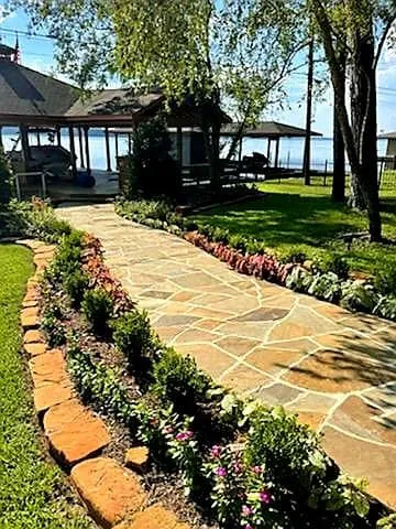 Professional outdoor landscaping in Huntsville, TX by Reed's Lawn & Landscaping Services