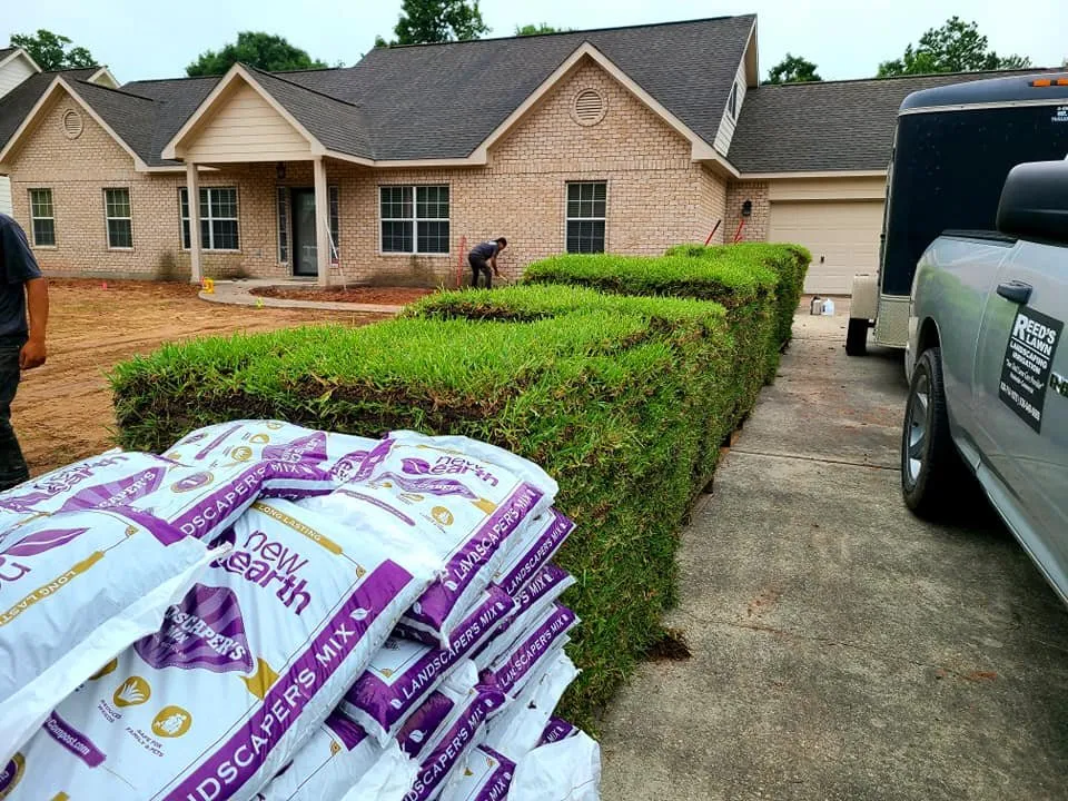 Local lawn care service for year-round maintenance in Huntsville, TX by Reed's Lawn & Landscaping Services