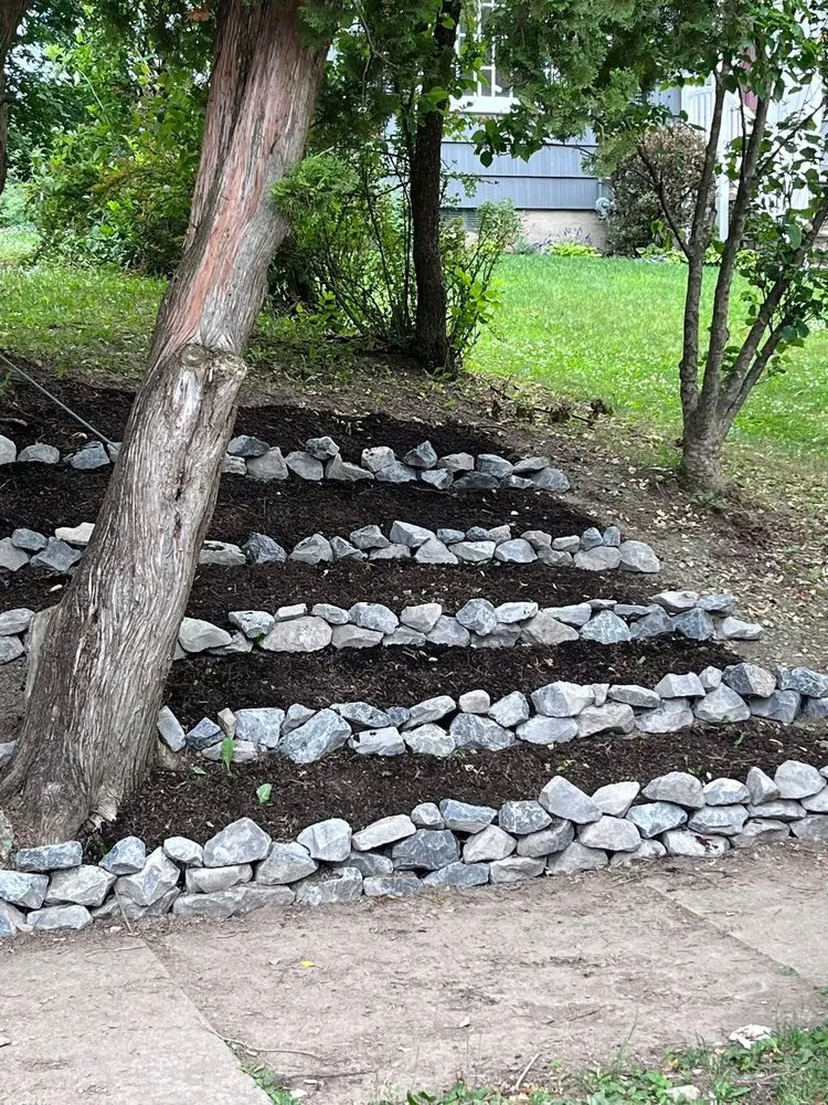 Custom landscaping services experts serving Syracuse, NY - Ree’s Stone Flourish and Bloom